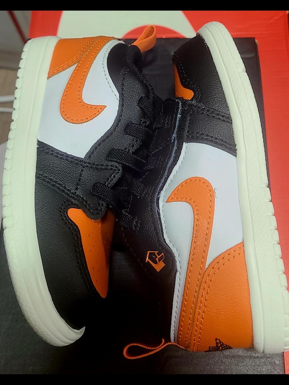 Jordan 1 Low Kids Black, White & Orange Sneakers 8C
